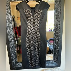 Connected apparel, hourglass shaped black dress size4 Pinup style fitting. NWOT